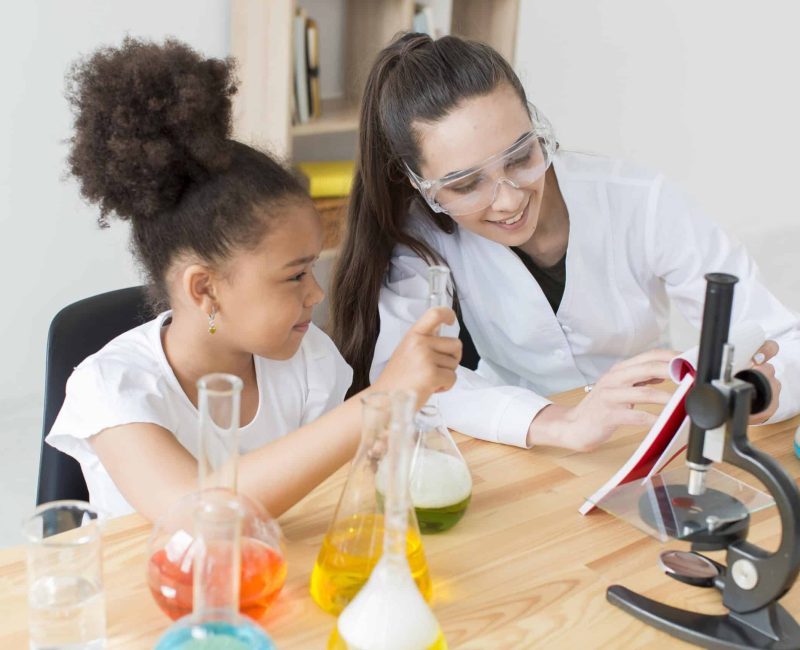 girl-female-scientist-having-fun-while-learning-science